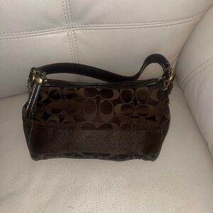 Coach Vintage
Coach Women's
Coach
2007 Brown Signature Brown Coach Women's Bag